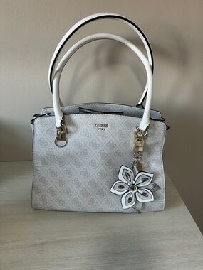 GUESS White Logo Satchel with silver Hardware and Floral Charm